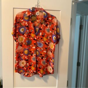 Cabi cap sleeved floral blouse.